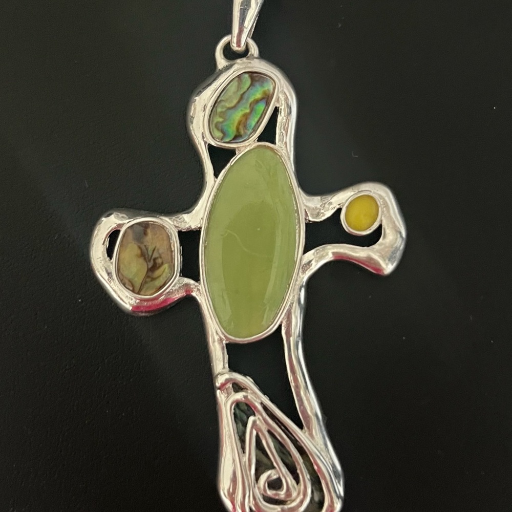 Artistic Silver Cross Pendant with Green and Yellow Stone Accents
